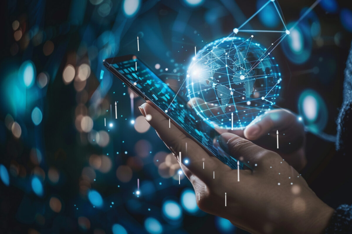 persona usando un mobil con un mundo digital delante
